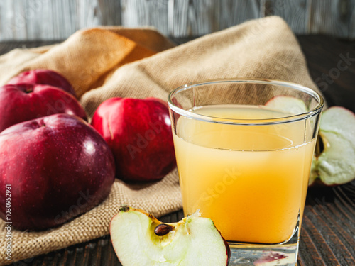 Organic Apple Cider and Fresh Red Apples, Healthy Autumn Beverage with Juicy Sweet Fruit photo