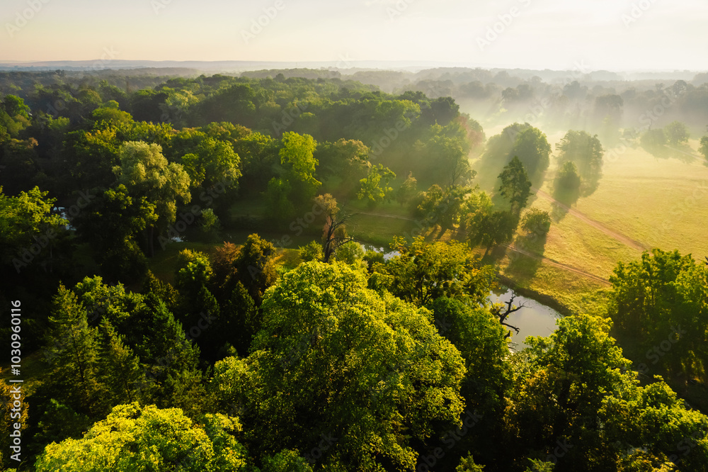Obraz premium Lednice Chateau with beautiful gardens and parks. Lednice Valtice Landscape, South Moravian region. UNESCO World Heritage Site.