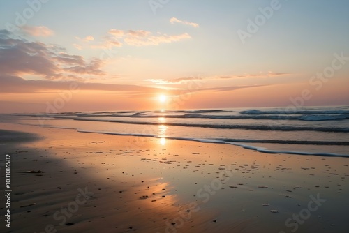 Peaceful beach sunrise with calm waves
 photo