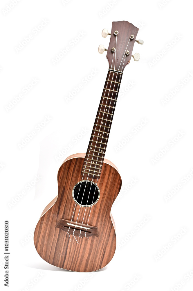 Fototapeta premium FRONT VIEW OF UKULELE ON ISOLATED WHITE BACKGROUND.