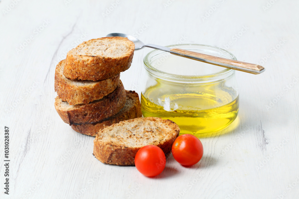 Slices of whole wheat toast with olive oil Slices of whole wheat toast with olive oil