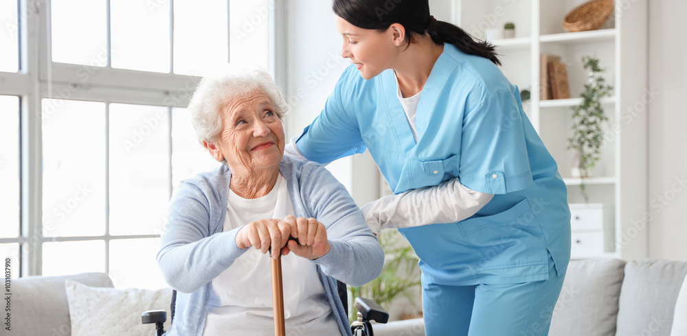 Senior woman in wheelchair with stick and nurse at home Senior woman in wheelchair with stick and nurse at home