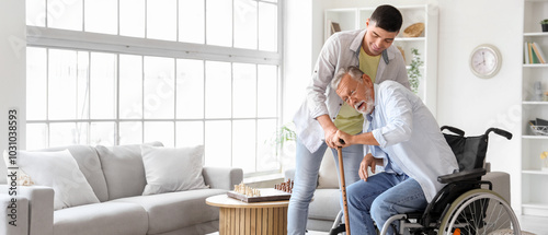 Senior man in wheelchair wi...