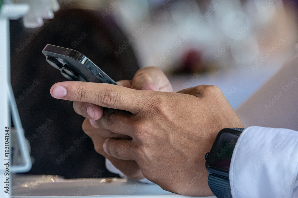 Obraz premium Close up of man use of mobile phone