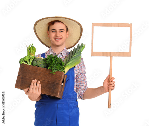 Male farmer with box of veg...