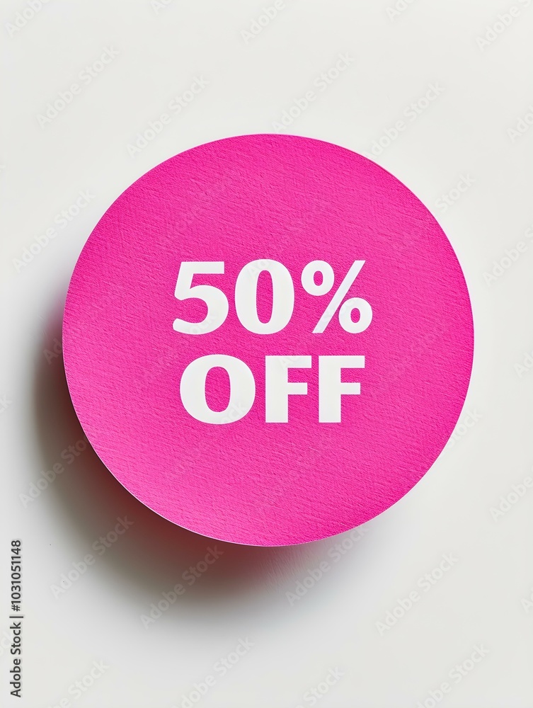 White '50% OFF' Text on a Pink Round Paper Note. White Background White '50% OFF' Text on a Pink Round Paper Note. White Background