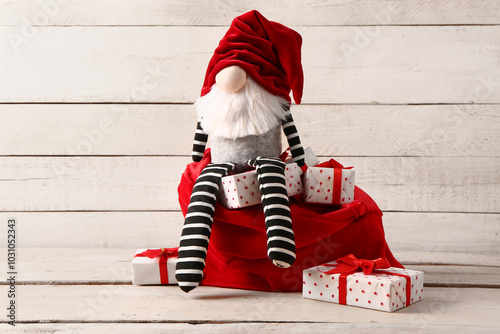 Christmas gnome with bag an...