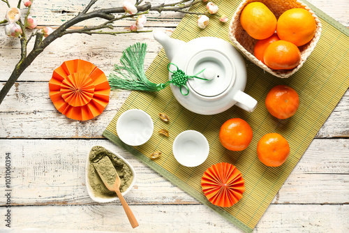 Teapot with mandarins, bowl...