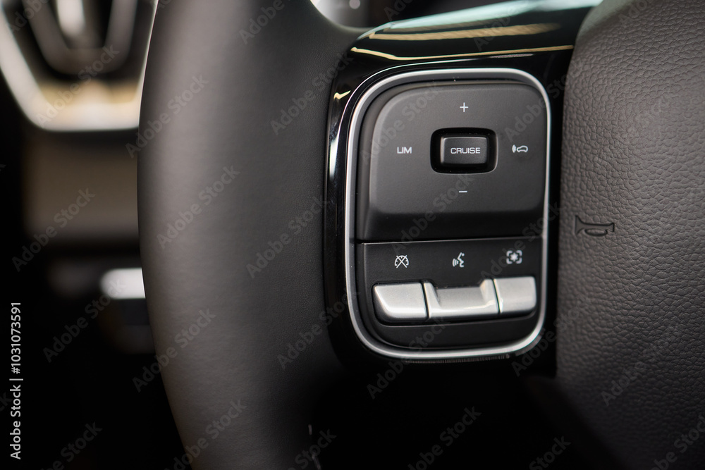 The modern cars steering wheel control panel boosts convenience and performance The modern cars steering wheel control panel boosts convenience and performance
