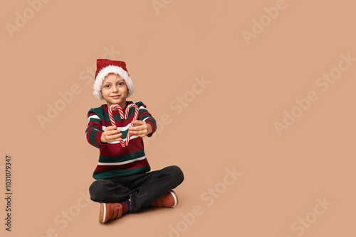 Cute little boy in Santa ha...