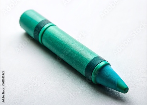 Vibrant Teal Crayon on White Surface Ideal for Artistic Creations, Crafts, and Colorful Illustrations in Various