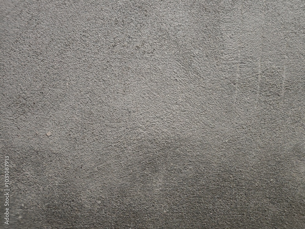 Fototapeta premium Texture of old concrete wall.Concrete wall of light grey color cement texture background.Grey pastel rough crack cement texture stone concrete,rock plastered stucco wall; painted flat fade background.