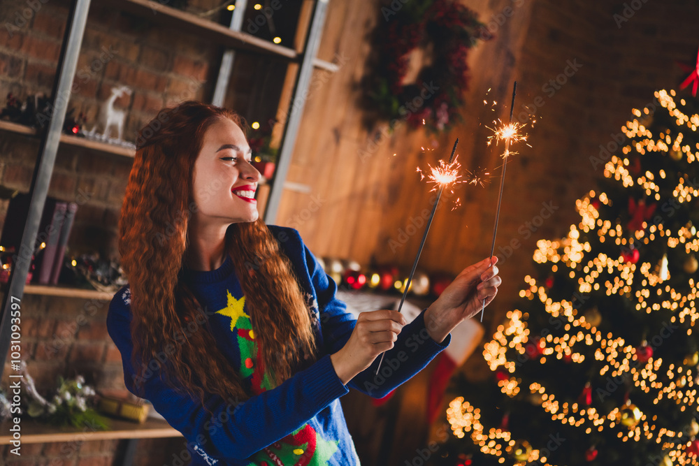 Photo of young girl dance hold bengal lights wear blue christmas clothes enjoy modern cozy x-mas party decoration interior flat indoors Photo of young girl dance hold bengal lights wear blue christmas clothes enjoy modern cozy x-mas party decoration interior flat indoors