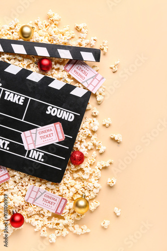 Movie clapper with popcorn,...