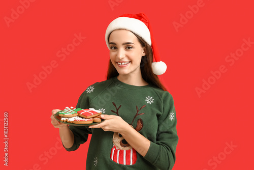 Young woman with tasty Chri...