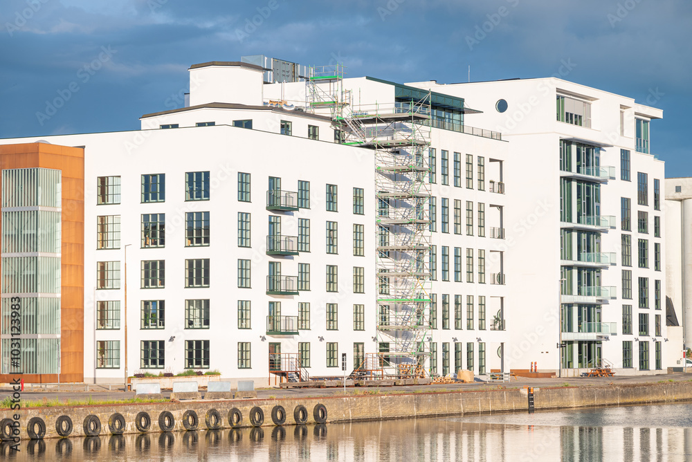 Fototapeta premium buildings bear the river in city of Odense in Denmark