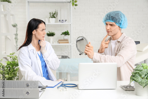 Thoughtful young man with p...