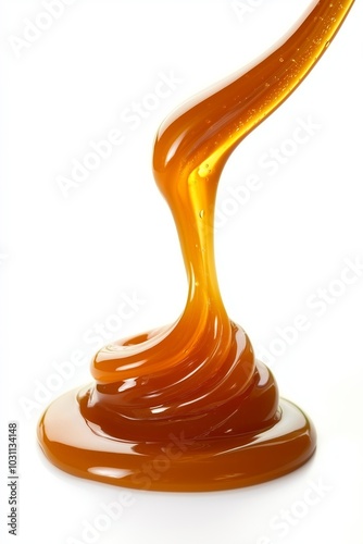 Abstract swirl of salted caramel sauce on a white background, showcasing a soft, glossy texture