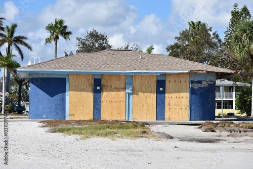 beach concession stand boarded up before storm at the beach