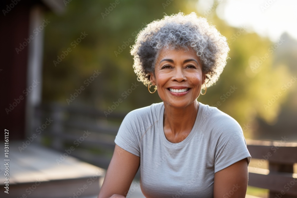 Fototapeta premium Portrait of a smiling senior Asian woman indoors at home