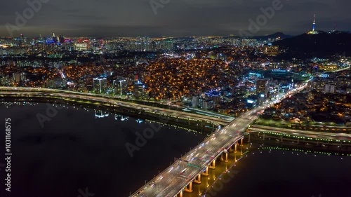SEOUL, SOUTH KOREA - SEPTEMBER 9, 2024: Stunning nighttime skyline with vibrant city lights and the Han River flowing through the metropolis