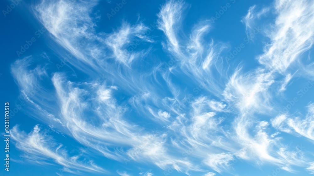 clear blue sky adorned with wispy white clouds, creating a serene and tranquil atmosphere. clear blue sky adorned with wispy white clouds, creating a serene and tranquil atmosphere.