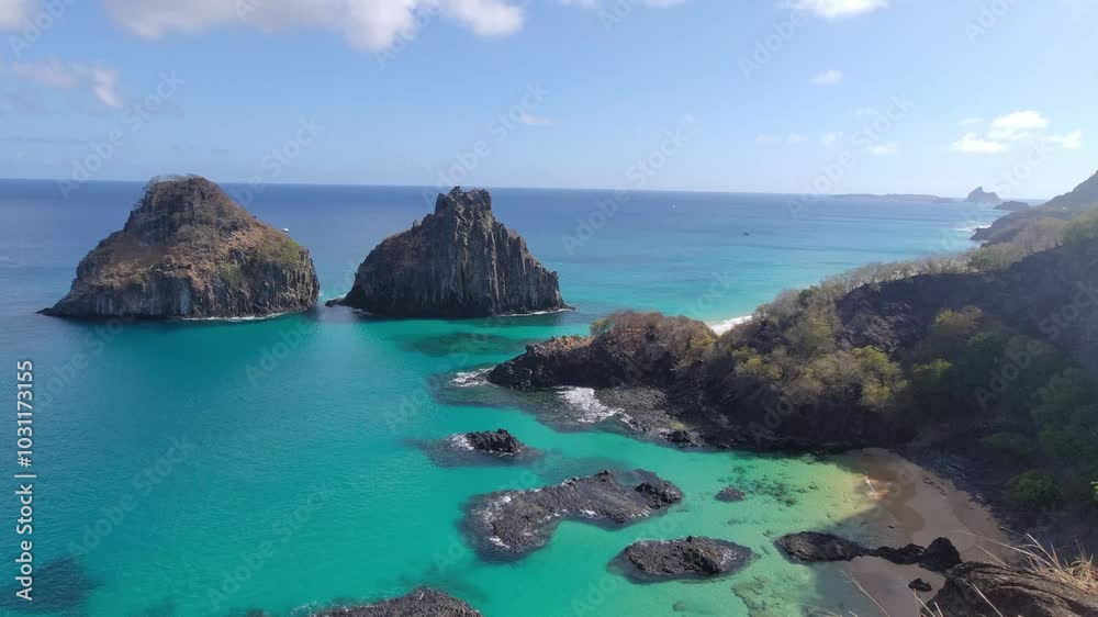 Morro Dois Irmao view, at Sancho Bay view point. Fernando de Noronha archipelago of volcano islands. Tropical scenery. Summer scenery. Brazil. 