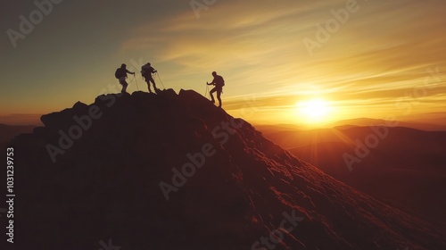 Three hikers stand on a mountain peak at sunrise, silhouetted against the bright orange sky.