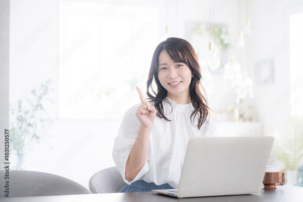 A woman sitting at a desk with a computer and posing for recommendations, points of view, etc. Looking at the camera Image of a young cute woman changing jobs, studying, etc. A woman sitting at a desk with a computer and posing for recommendations, points of view, etc. Looking at the camera Image of a young cute woman changing jobs, studying, etc.