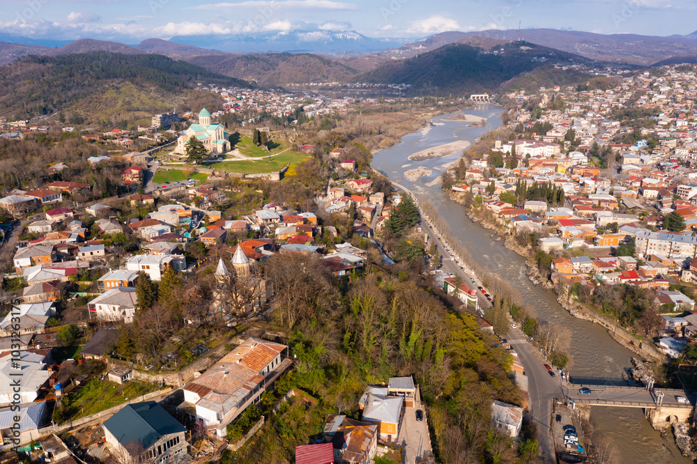Fototapeta premium View from drone of Bagrati Cathedral and center of Kutaisi in spring day, Georgia