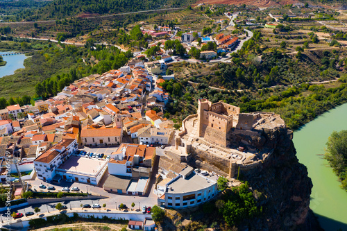 Top view of the city of Cofrentes and the medieval castle by the river. Spain photo