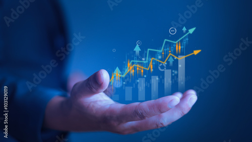 Hand holding growth business strategy arrow concept with increase development graph profit or growing economy investment income target and goal increase achievement on development strategy chart.