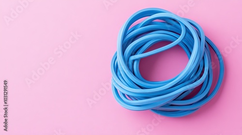 Blue Rubber Bands on Pink Background