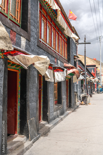 The grey houses of the Tibetan village in the West of Tibet photo