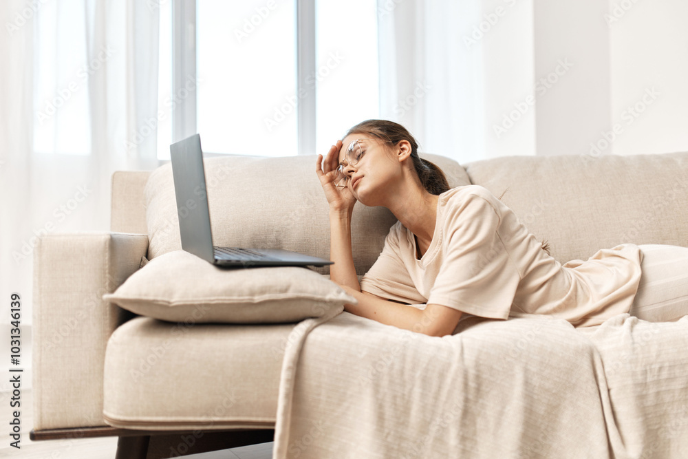 Smiling Woman Working on Laptop at Cozy Home Smiling Woman Working on Laptop at Cozy Home