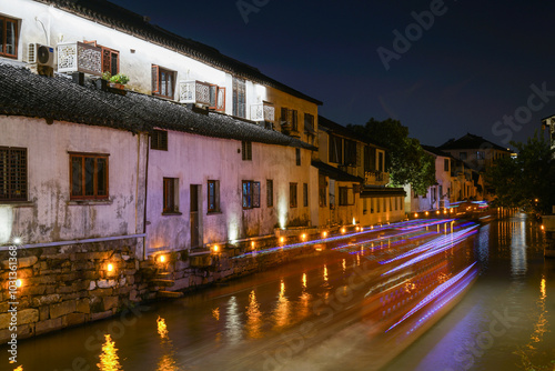 view of the ancient chinese city hall in the night photo