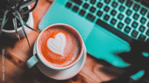 A cozy coffee scene with a heart-shaped latte art design photo