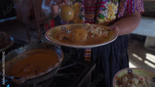 More recado is served to pepián blanco, a traditional dish from Guatemala. The rich white sauce gently drips over the ingredients, highlighting the creamy texture and deep flavor of the stew.