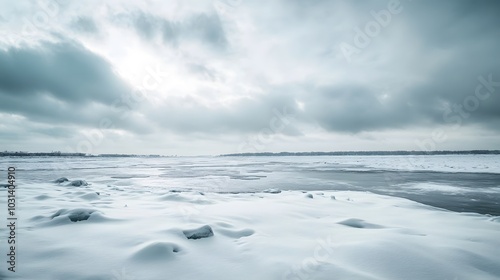 Snow Drifting Across Icy Landscape