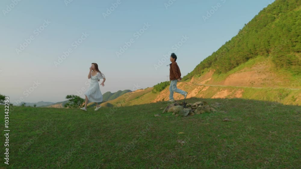 man chasing woman concept running in circle in nature up to the hill in slow motion , relationship friendship beloved man chasing woman concept running in circle in nature up to the hill in slow motion , relationship friendship beloved