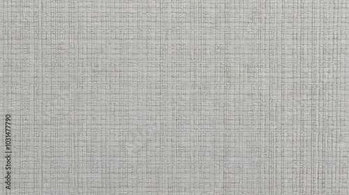 close up view of a gray textured fabric background features a grid like pattern with intersecting horizontal and vertical lines, creating a subtle checkered effect