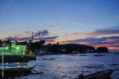 Puerto Galera, Philippines a tourist destination image taken at end of day sunset time.