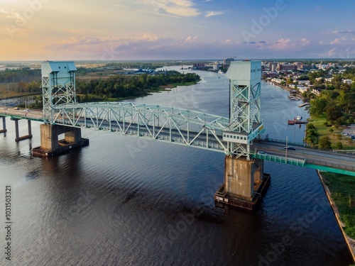 Cape Fear Memorial Bridge crossing the Cape Fear River at sunset in Wilmington, North Carolina, United States. photo