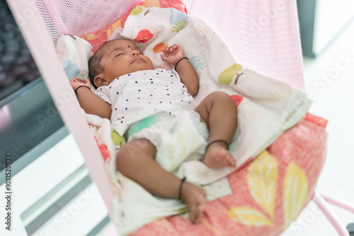 Photography ndian family spending time together, wearing traditional and casual outfits with a baby, a young girl, and grandparents in a high-rise apartment in Kuala Lumpur, Malaysia