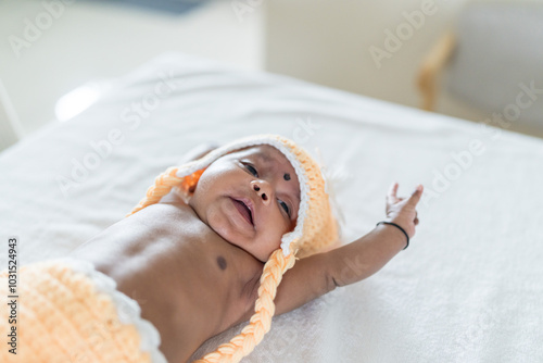 Photography ndian family spending time together, wearing traditional and casual outfits with a baby, a young girl, and grandparents in a high-rise apartment in Kuala Lumpur, Malaysia