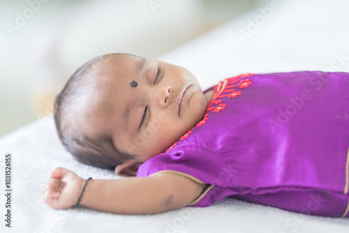 Photography ndian family spending time together, wearing traditional and casual outfits with a baby, a young girl, and grandparents in a high-rise apartment in Kuala Lumpur, Malaysia