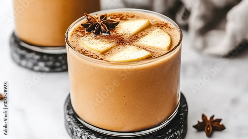 warm drink with apple slices and spices evokes cozy feelings photo