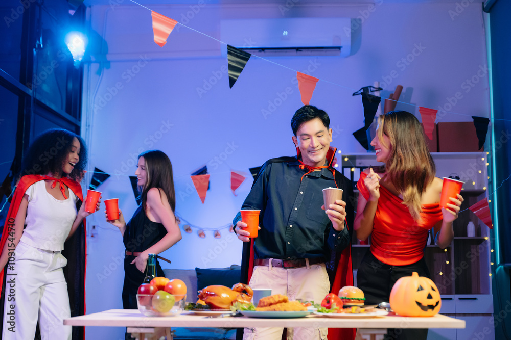 Joyful friends in vibrant Halloween costumes share drinks and laughter at a festive indoor party. Joyful friends in vibrant Halloween costumes share drinks and laughter at a festive indoor party.