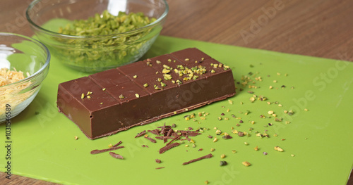 Dubai chocolate with pistachio paste and kataifi dough. Confectionery food and sweets with your own hands at home in the kitchen.
