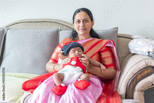 Photography ndian family spending time together, wearing traditional and casual outfits with a baby, a young girl, and grandparents in a high-rise apartment in Kuala Lumpur, Malaysia
